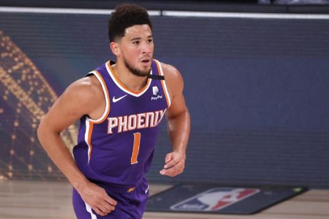Devin Booker caught on the camera in Phoenix shirt.